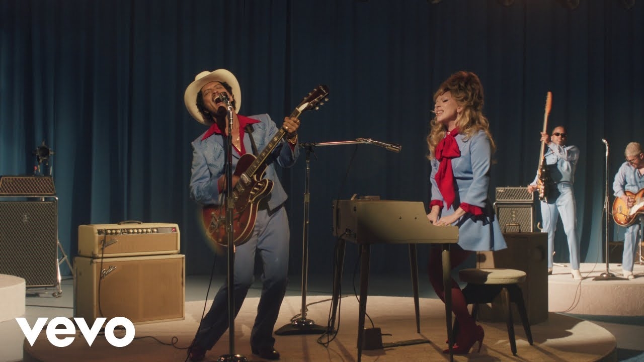 Lady Gaga and Bruno Mars present the music video “Die With a Smile”